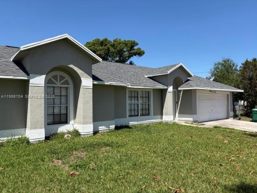 Photo of 2992 SW Lucerne St, Port St Lucie, FL 34953 (MLS # A11998704)