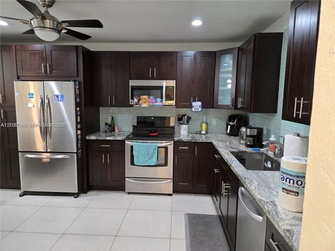 Photo of 295 Jacaranda Dr #20, Plantation, FL 33324 (MLS # A12009536)