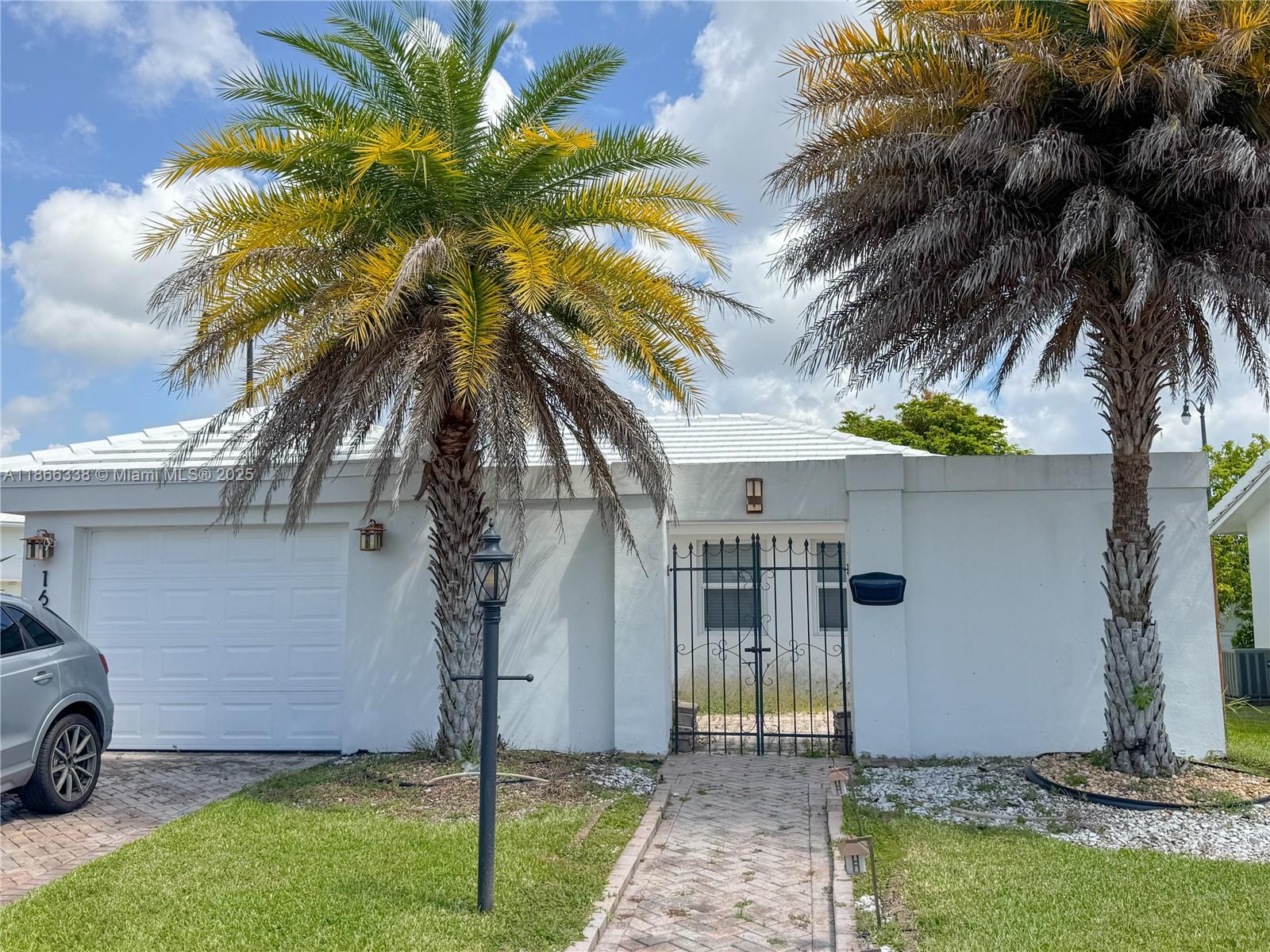FULLY FURNISHED & SMART ECO-FRIENDLY HOME! This beautifully renovated 2-bedroom, 1-bath corner single-family home (910 SqFt) in Leisureville 55+ Community is updated from top to bottom. Featuring a newer roof, impact windows & doors, washer & dryer, A/C, water heater, modern kitchen, and furnished interior, this home is truly move-in ready. Includes garage + double-wide driveway. Leisureville offers incredible amenities: 2 clubhouses, 2 heated pools, free 9-hole executive golf course, billiards, shuffleboard, shuttle bus & more. HOA covers water, lawn & sprinkler maintenance. Tenant pays electricity, cable & trash. At least one occupant must be 55+ and HOA requires a minimum 700 credit score. First, last & one month security due at move-in. HOA approval required prior to occupancy.