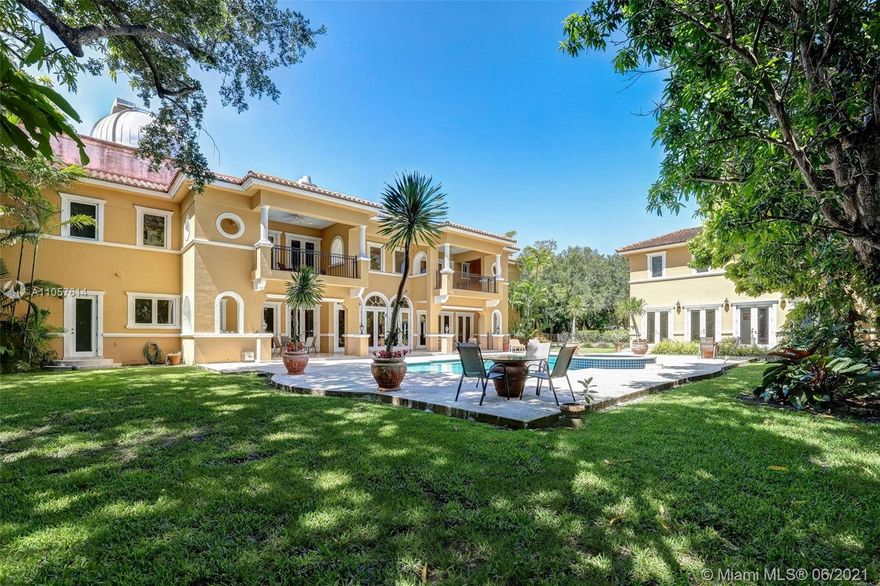 Rare opportunity in the exclusive gated Windmill Estates in Ponce Davis. This traditional 2-story home is nestled at the end of a cul-de-sac boasting 4 beds, 5.5 baths, 2 maids quarters and a detached 2-story guest house. Soaring ceilings and winding staircase from the impressive foyer entry. Master suite includes sitting area, office, fireplace, 2 walk-in closets, soaking tub and separate shower. Chef's kitchen with dual appliances and pantry. Guest house includes 2 beds, 2 baths, den, full kitchen, dining/living area and generator. Covered terrace with summer kitchen. Multiple balconies overlooking the pool and spa. Additional features include incredible observatory with professional telescope for stargazers, 3 car garage, and elevator. Adjacent ¾ acre lot available to build a compound.