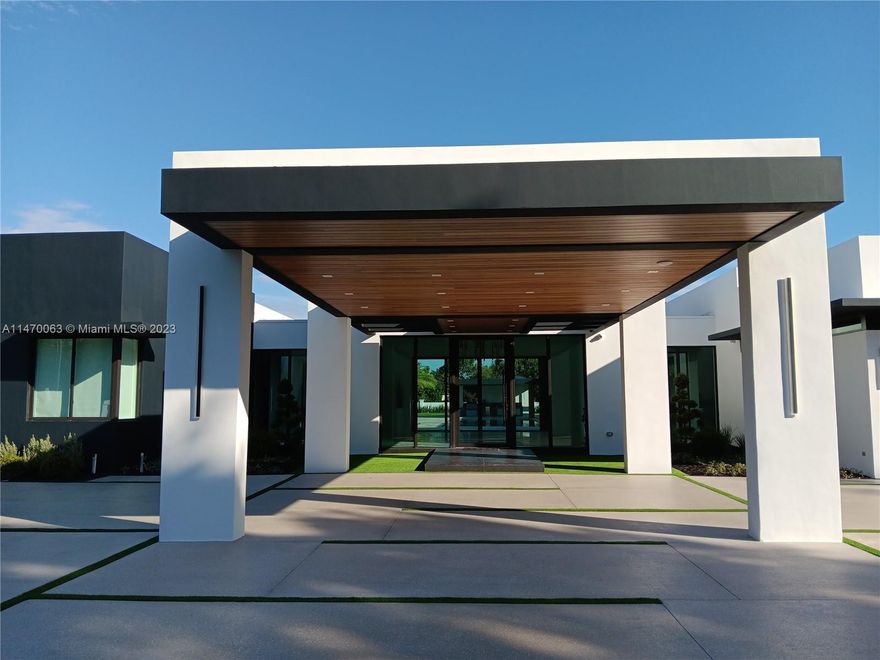 NEW CONSTRUCTION approx 10,180+/- total, 6822+/- LV sqft, FULLY SMART HOME!! MAJESTIC 7 beds/6.5 baths w/Porcelain Italian tile, 17 ft ceiling entry foyer, 12 & 10.5 ft ex/interior walls. Impact doors & windows, M/C (his/her), 2 smart baths: M/bath w/smart toilet & infinity bath. 1 mini M/bath w/smart toilet, 5 Toto toilets in other bath & cabana bath. 1 Jack & Jill bath. 2 guest rooms or in-laws quarters & 1 bath, 400 sq ft gym room, storage & laundry room. Interior smart kitchen w/Fisher & Paykel kitchen appl. wine cooler, exterior kitchen, dining & Florida, Ex/interior surround sound, Gas/laundry, Summer kitchen w/ barbeque grill & underground gas tank w/1000 gals capacity. Pool w/temp regulated heat/cold/Jacuzzi/Gazebo/Waterfall, Mini Golf Area, 1/2 Basketball Court, LED Lights