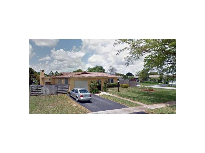 EXPANDED LIVE OAK MODEL*SHOWS GREAT*HUGE 27X12 FAMILY ROOM - MEDIA ROOM WITH A NATURAL FIREPLACE*PLENTY OF CABINET & TABLE SPACE IN THE KITCHEN AND A SKYLIGHT*PLUS A 20X10 FORMAL DINING ROOM*STAINLESS STEEL KITCHEN APPLIANCES*REMODELED GUEST BATH*REAL WOO D FLOORS*CERAMIC TILE*HI-HAT LIGHTING*UPDATED AC & ELECTRICAL PANEL BOX 2013*ACCORDIAN SHUTTERS AND/OR STORM PANELS*POOL CHILDREN SAFETY FENCE*OVERSIZED CORNER LOT*ROOM FOR A SWINGSET & ENTERTAINING*WOOD PRIVACY FENCE*VOLUNTARY HOA WITH DEED RESTRICTIONS