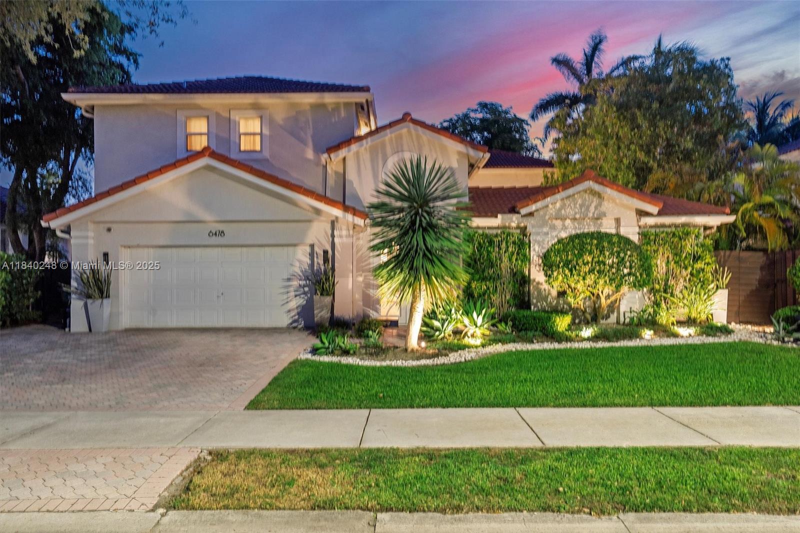 Welcome to this stunning 5-bedroom, 4-bath home in the sought-after Doral Isles Riviera. With over 3,500 sq ft of living space, this bright and spacious residence offers an open layout ideal for both relaxing and entertaining. The gorgeous kitchen features sleek, modern finishes and flows seamlessly into the main living areas. Upstairs, enjoy generously sized bedrooms, beautifully updated bathrooms, and a peaceful open balcony. Outside, unwind by your private pool surrounded by serene, low-maintenance landscaping that feels like a retreat. This home also includes a 2-car garage and access to resort-style amenities including pools, tennis, basketball, playgrounds, fitness center, and more. Located near parks, dining, and shops—come experience the lifestyle that makes Doral Isles so special.