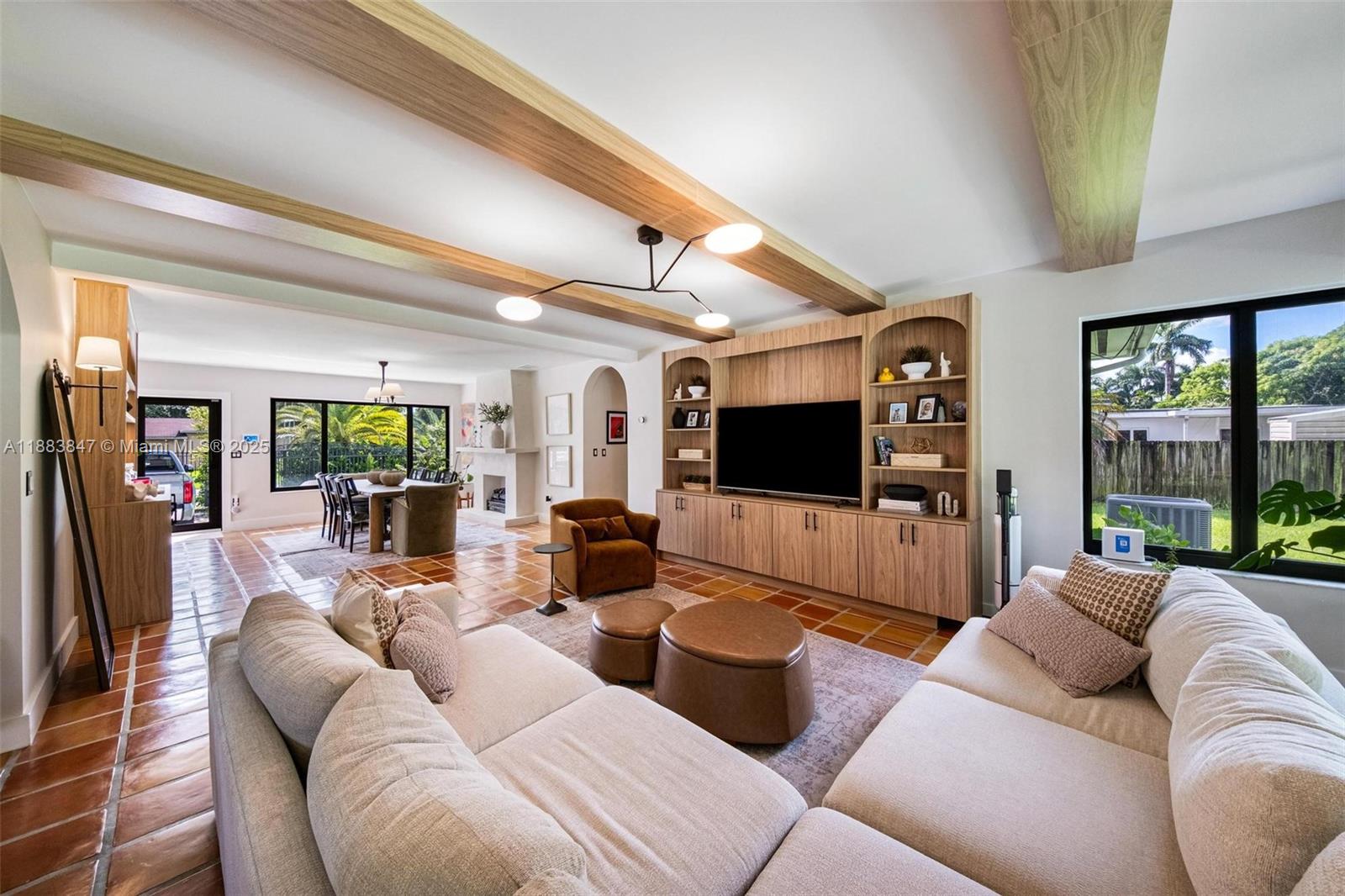 Charming 3-bed / 2-bath single-story home in Biscayne Gardens, fully renovated and move-in ready! Features include new terra cotta floors, a kitchen completely updated with modern finishes and appliances, and premium water systems: tankless heater plus cloud reverse-osmosis for sink & refrigerator. Impact windows & doors. Solar utility enrollment helps lower energy bills. EV charger outlet already installed. Spacious lot, fenced yard, bright open layout.
