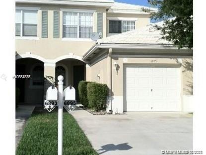Beautiful 3 bedroom, 2 1/2 bathroom townhome in the gated community of Lantern Key, with club house, pool and more. Spacious unit offers neutral decor, attached one car garage, screened patio. The community has a resort style pool, fitness center and a gorgeous clubhouse. Close to schools, shopping, and restaurants. Move right in. Bring your offers!