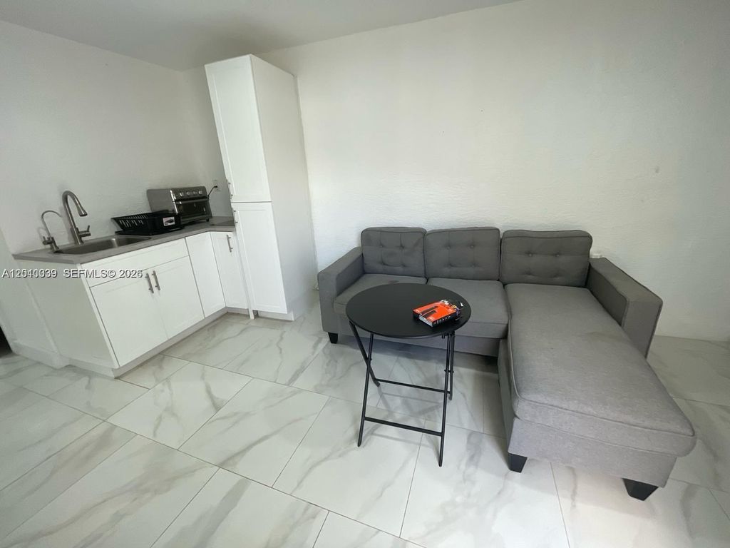 Photo of 2320 SW 44th St #A, Fort Lauderdale, FL 33312 (MLS # A12010039)