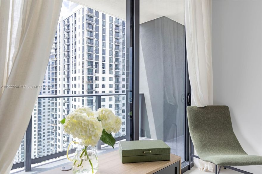 Step into this fully furnished, move-in-ready residence showcasing stunning city and bay views. Perfect as a chic urban home or high-performing investment, this unit offers style and flexibility in a brand-new 2024 building.

Enjoy resort-style amenities including a full-service spa, pool, kids’ play area, three on-site restaurants, meeting rooms, and more.

The 2-bed, 2-bath layout features designer décor, a wraparound balcony, custom closets, and exceptional attention to detail—truly turn-key.

Unbeatable location across from the Kaseya Center, and just steps to Miami Worldcenter, Bayside Marketplace, and the waterfront—live or invest in the center of it all.