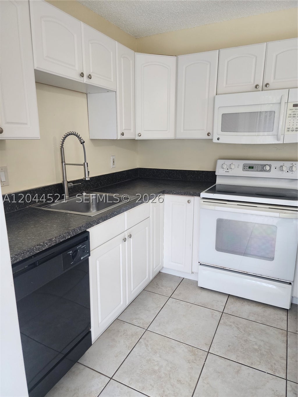 Photo of 2148 White Pine Cir #A, Green Acres, FL 33415 (MLS # A12044521)