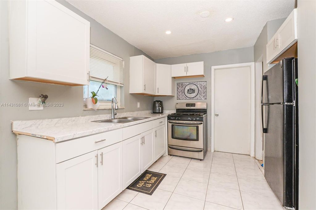 Photo of 143 NE Bracken Rd, Port Saint Lucie, FL 34983 (MLS # A11431081)