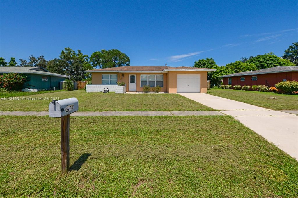 Photo of 143 NE Bracken Rd, Port Saint Lucie, FL 34983 (MLS # A11431081)