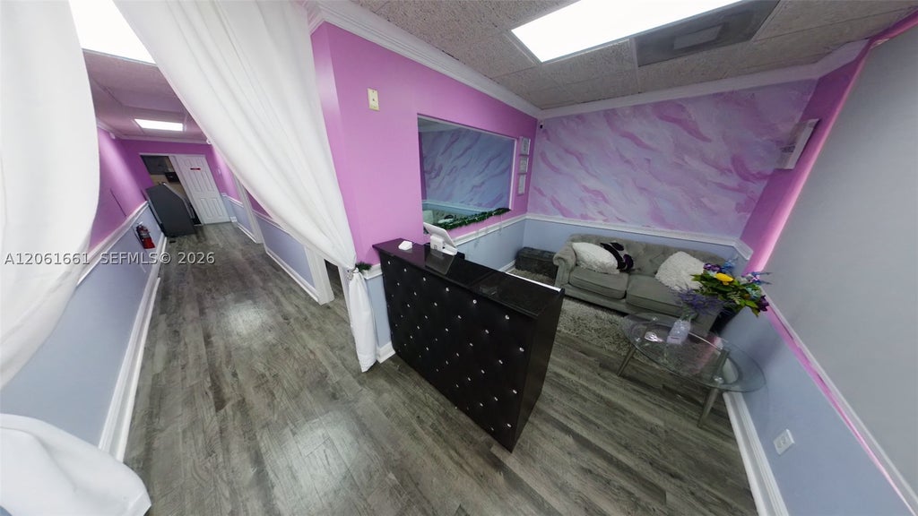 Photo of 7300 W McNab Rd #203, Tamarac, FL 33321 (MLS # A12061661)