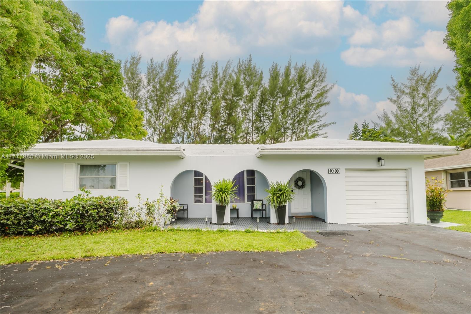 Welcome to this fully remodeled 3-bedroom, 2-bathroom move-in ready home located in a quiet, safe neighborhood in the heart of Tamarac. Enjoy a spacious contemporary kitchen with high-end stainless-steel appliances, sleek white cabinetry, and quartz countertops. The living room is equipped with a built in fireplace.
Step outside to your private backyard retreat, complete with a covered patio, outdoor jacuzzi which will convey with sale, and fire pit—perfect for year-round entertaining.
Additional features include a partially converted garage with home office, upgraded flooring, and Durable concrete tile roof. Sprinkler system is supplied by a monitored well, keeping your water bill low.
Conveniently located near parks, shopping, dining, and major highways. This property is a must-see.