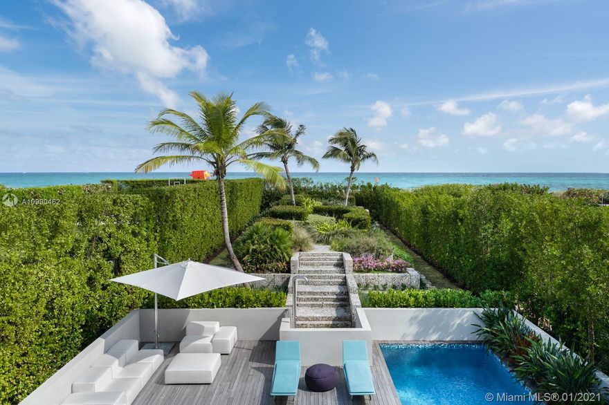 An architectural masterpiece in Miami Beach’s only private oceanfront residential enclave. The home’s exposed steel structure and exquisite design reveal a rare balance of brilliant craftsmanship & functionality, with resort-style amenities and panoramic ocean views for the ultimate Miami lifestyle. Interior features include Victrocsa “invisible wall” windows, Boffi Kitchen with Gaggenau appliances, stunning master suite, custom Porro closets, Boffi bathrooms, Valli Valli door fixtures, Savant smart home system, elevator, office, guest room, and rooftop deck with jacuzzi. Fully equipped first level retreat with home theater, spa & steam room, cold plunge, sauna, & Technofit gym. Expansive outdoor entertaining deck with summer kitchen, cabana, oceanfront garden & pool with 60 ft swim lane.