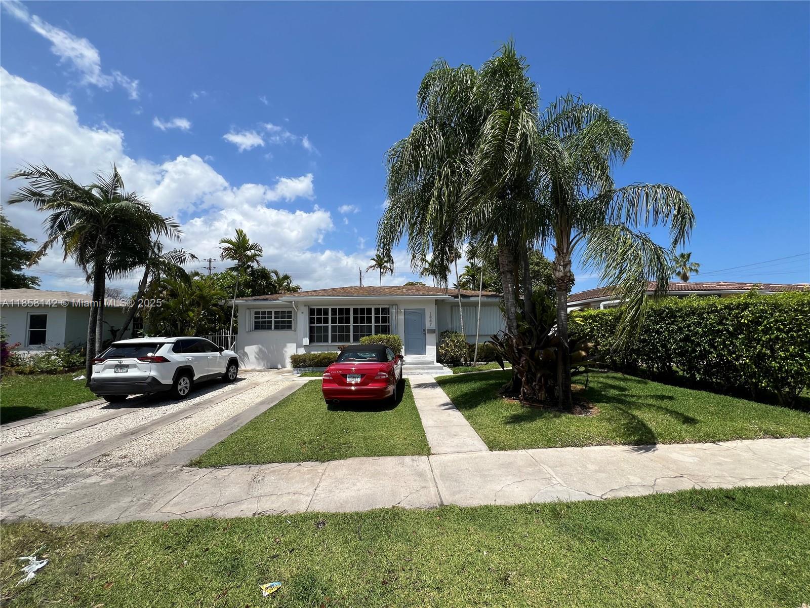 Single Family Home is three bedrooms, three bathrooms, and has a screened-in lanai in the back, perfect for relaxing. House has a separate kitchen, living room, and dining room. House has been remodeled including bathrooms, kitchen and floors. Separate room for laundry. Walking distance to food markets with cooked food by the pound, fresh fruit/veg markets, bakery, specialty markets, cafes, retail stores, and restaurants and bars. Minutes from downtown Hollywood and Hallandale. Approx 10-12 minutes to the Beach and I-95, Aventura Mall, and Airport.