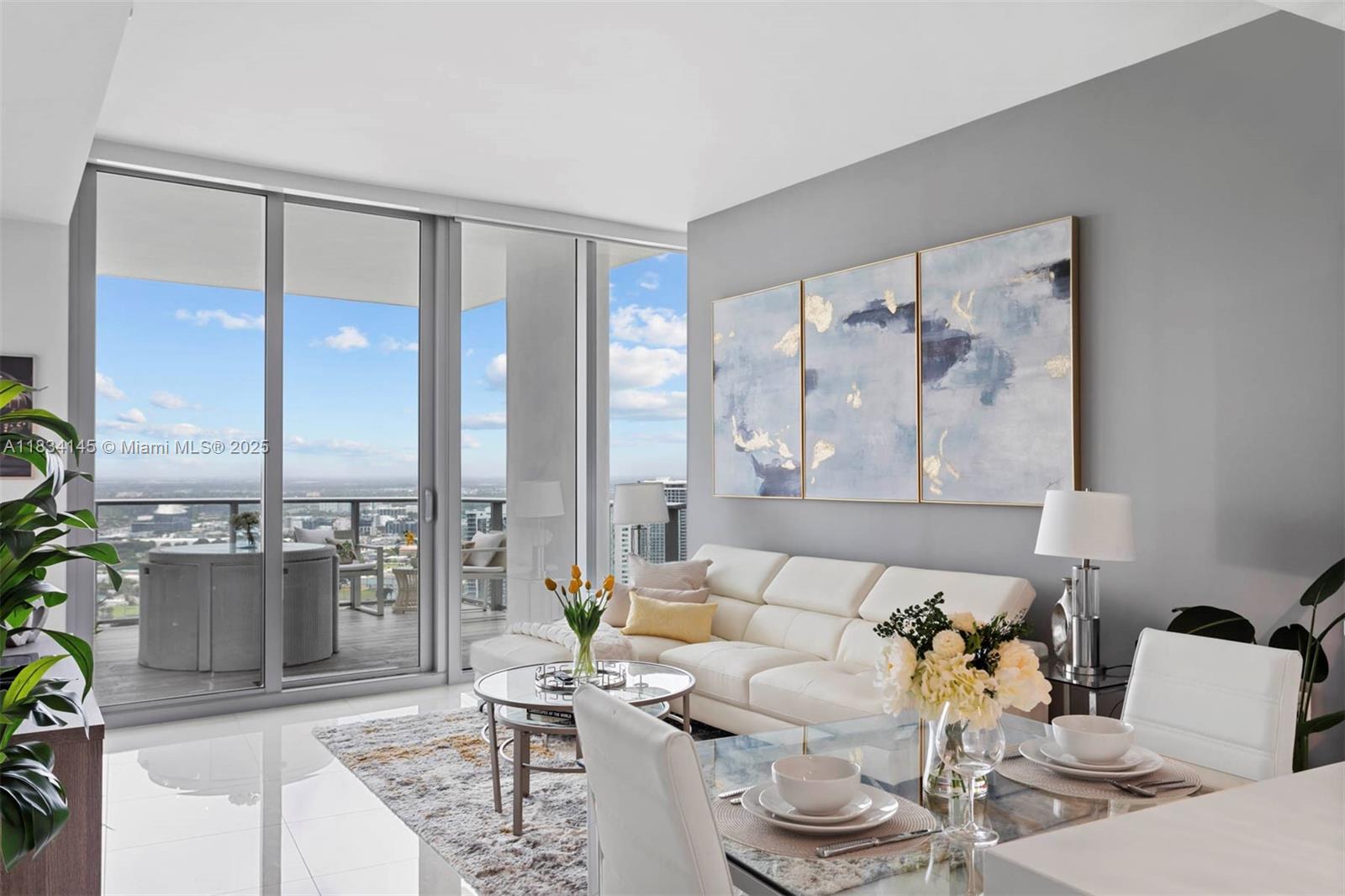 Discover unparalleled comfort in this fully furnished 1-bedroom apartment with a den converted into an office and 2 full baths at Paramount Miami Worldcenter. Recently painted and outfitted with new furniture, a sound bar
system, and top-of-the-line Bosch appliances, this residence boasts a spacious 200 sqft balcony. The building offers an array of world-class amenities, including a gym with a boxing ring, 2 yoga studios, 5 swimming pools (including a rooftop pool), a recording studio, a market, a business center, an on-site spa, tennis courts, a golf simulator, a soccer field, a basketball court, racquetball courts, lounges, a BBQ area, and more. Ready for immediate move-in with just your personal belongings. Easy to show!