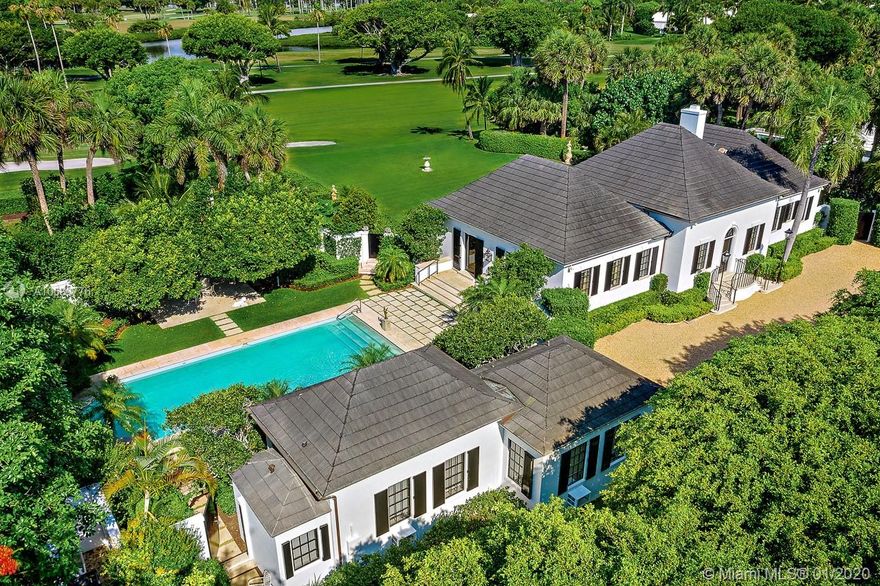 Designed by distinguished architect F Burrall Hoffman, 26 Gomez Road is one of Jupiter Island's most iconic and beloved houses. Sitting on over a half acre with glorious views of the golf course and creek beyond, this wonderful property is anchored by old growth trees, lush landscaping and formal gardens. The living room includes a soaring ceiling, Louis XV fireplace surround and wet bar. In the master bedroom, antique French boiserie paneled walls add to the elegance found throughout the house. Large cook's kitchen with separate breakfast area and expansive pantry includes top of the line appliances. There is a separate two bedroom guest house adjacent to the pool which allows guests and family privacy. Convenient location minutes from the bridge allows quick off Island access.