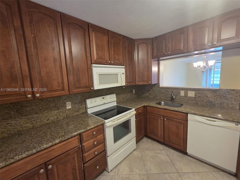 Photo of 6675 S Oriole Blvd #1040, Delray Beach, FL 33446 (MLS # A11965946)