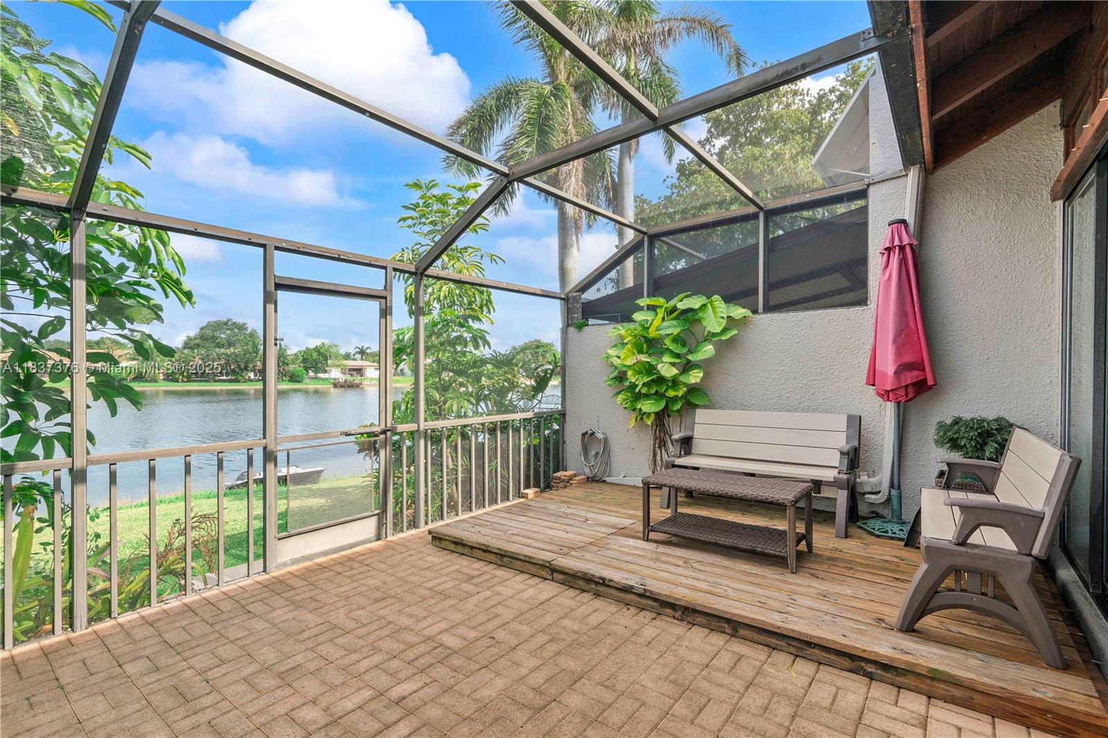 Enjoy breathtaking lakefront views & spectacular sunsets from your screened patio on this rarely available 3-bed, 3-full bath Fee Simple two-story corner townhouse surrounded by tranquil lakes & waterways. This family orientated Villas Lakes Pembroke Pines community has extremely low HOA fees include cable tv, community pool, clubhouse, tennis/pickleball/basketball/racquetball courts. Located on the hospital electric grid, you'll enjoy peace of mind with minimal power interruptions. Pembroke Lakes Golf & Country Club, Pembroke Lakes Mall, CB Smith Park, top-rated schools, excellent dining, beaches, Hard Rock Casino & Stadium, the Stanley Cup Champion Florida Panthers Arena & major highways are all within a short drive. Don’t miss this rare opportunity to own an affordable waterfront home.