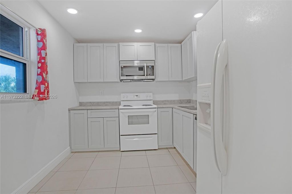 Photo of 2850 Somerset Dr #414L, Lauderdale Lakes, FL 33311 (MLS # A11973222)