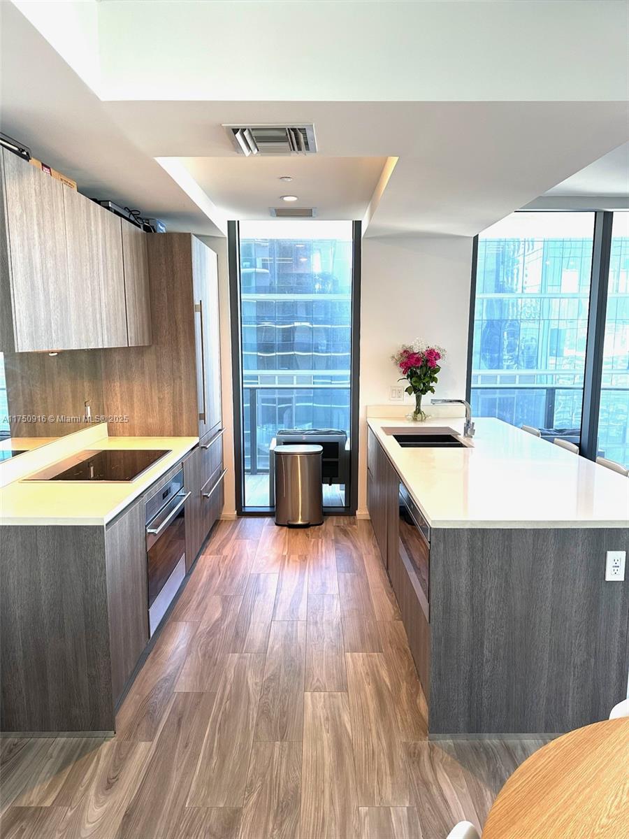 Stunning Corner Unit at SLS Lux in Brickell
Experience luxury living in this immaculate 2-bed, 2-bath residence. Fully furnished with private elevator entry with biometric access, ensuring security and exclusivity. The open design highlights a spacious living area with floor-to-ceiling windows.
Key Features:
Private Foyer & Wrap-Around Balcony.
Gourmet Kitchen: Top Line appliances and sleek finishes.
Master Suite: Features a large walk-in closet, and a spa-like bathroom with a double vanity.
Additional Bedroom: Well-appointed with ample closet space and access to a modern bathroom.
World-class amenities, including:Two pools, spa, gym, tennis court and lounge areas.
In the heart of Brickell offering unparalleled access to fine dining, shopping, and entertainment, just steps away.