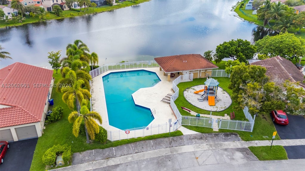 Photo of 18451 NW 22nd St, Pembroke Pines, FL 33029 (MLS # A12062661)