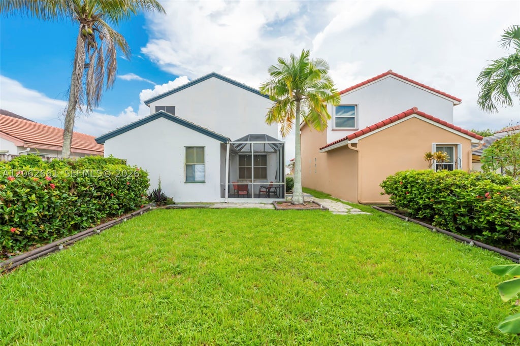 Photo of 18451 NW 22nd St, Pembroke Pines, FL 33029 (MLS # A12062661)
