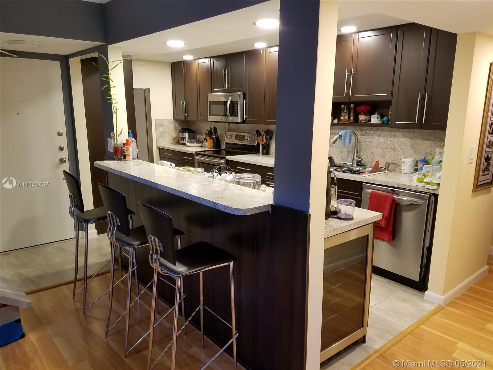 BEAUTIFULLY REMODELED CONDO IN A GATED COMMUNITY ON THE INTERCOASTAL WATERWAY. FEATURES NEW CABINETRY, OPEN KITCHEN WITH ISLAND AND BAR TOP, STAINLESS STEEL APPLIANCES, HIS AND HERS CLOSETS, GLASS SHOWER BATHROOMS, ALL HURRICANE IMPACT WINDOWS AND DOORS, AND WRAP AROUND BALCONY. LARGEST REMODELED APARTMENT IN THE AREA, CORNER UNIT.