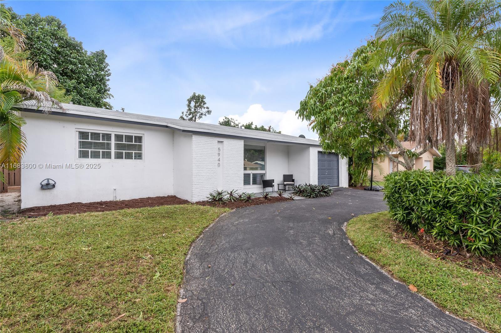 Create your personal oasis in this stunning 3-bedroom, 2-bathroom home in the tropical paradise of Sunrise, FL. This chic family home features generous living spaces and stylist bathrooms with contemporary finishes throughout. The updated eat-in kitchen features stainless steel appliances, a gas range, updated cabinets and a serving window ideal for family gatherings or entertaining. Enjoy luxurious outdoor living with a covered front patio, private pool, screened back porch and large backyard with tranquil garden views. Aluminum hurricane panels offer peace of mind for this property in a prime location near highways, shopping malls, and restaurants. Don't miss the opportunity to make this perfect blend of comfort, style, and convenience your new home. Schedule a showing today!