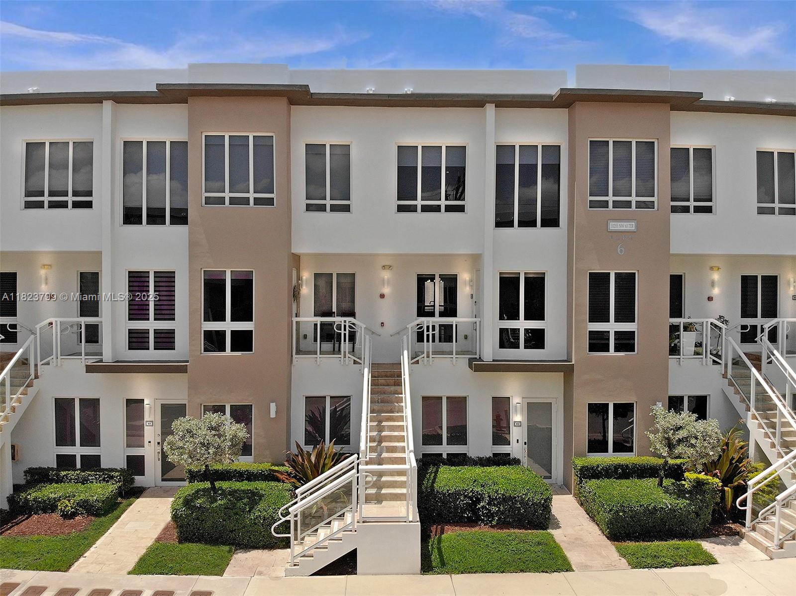 Experience the comfort of a home in this stunning 2 story condo located in Landmark at Doral. Featuring elegant porcelain tile flooring on the first level and expansive open-concept living areas flexible enough to convert into a fourth bedroom this residence is designed for modern living. The sleek, contemporary kitchen boasts a central island, stainless steel appliances, a wine cooler, and a wall-mounted range hood. Upstairs, you’ll find three spacious bedrooms, including a luxurious primary suite with a double vanity, glass-enclosed shower, and a private water closet. The property also includes a covered garage. Enjoy access to Landmark’s exceptional clubhouse amenities, including a resort pool, fully equipped gym, tennis courts, social rooms. The community offers 24-hour security.
