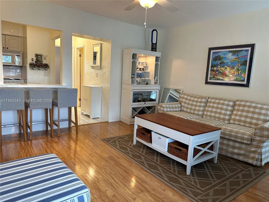 Beautifully furnished 1 bedroom 1 bath updated Co-Op in the heart of Hallandale Beach! Move In ready with Impact Windows, New Swimming Pool, and an Extra Storage Space.  Close to the 
Beach, Shopping, Restaurants, Casinos and Medical facilities. Interior features include a queen sized bed with dressers, a desk and  2 tv's plus a built in murphy bed with a queen size mattress for guests. The kitchen is fully stocked with dishes and cooking equipment. Dining for four or eat at the open bar! Lowest maintenance fees in the area. Laundry facilities on site and a new heated pool to enjoy. 55 Plus Community.