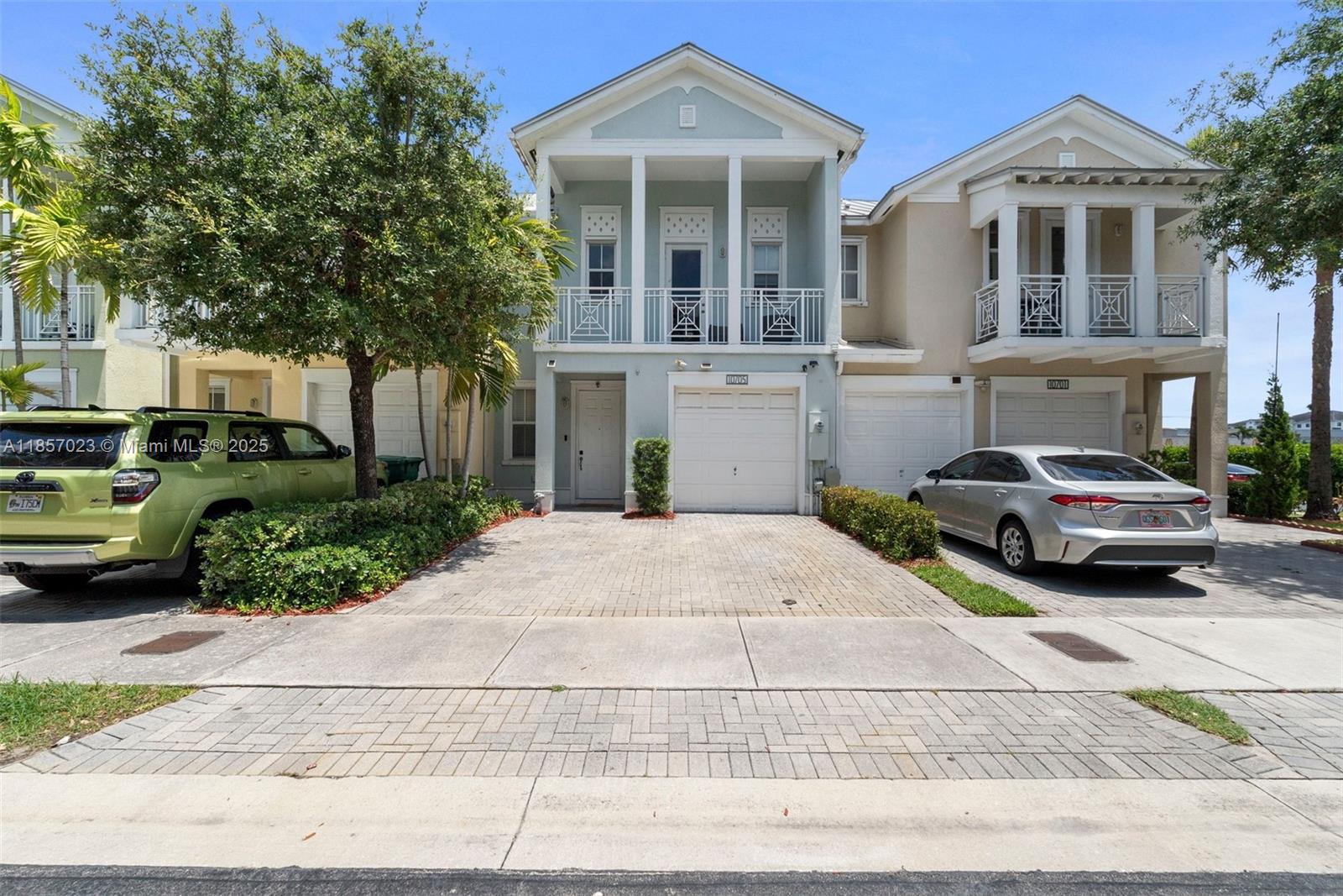 **Annual Rental** Discover style and comfort in this upgraded 3-bed, 3-bath townhouse at The Reserve at Doral. A first-floor bedroom and full bath are perfect for guests or a home office. Enjoy sleek floors, a modern kitchen with premium finishes, and spa-inspired baths. The patio with built-in grill is ideal for entertaining. Upstairs, the primary suite offers a custom walk-in closet and private balcony, joined by another ensuite bedroom with its own balcony. Resort-style amenities include a clubhouse, pool, and fitness center in a secure, gated community close to top schools, the Turnpike, and Doral’s best dining, shopping, and entertainment. This opportunity won’t last—schedule your visit today!