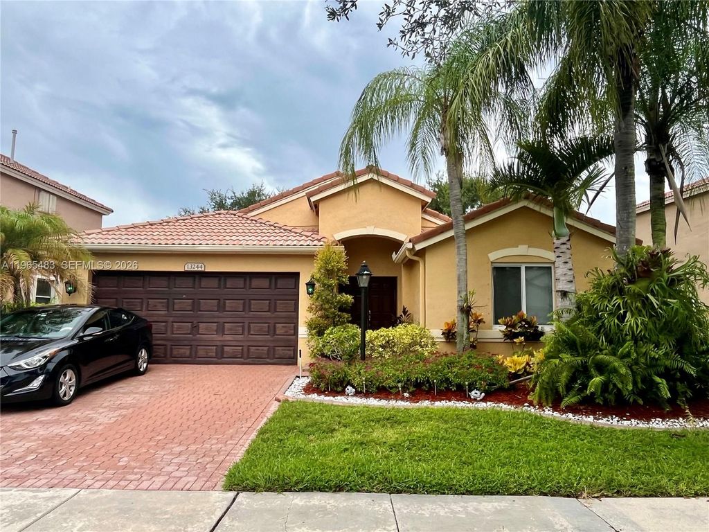 Photo of 13244 NW 12th St, Pembroke Pines, FL 33028 (MLS # A11965483)