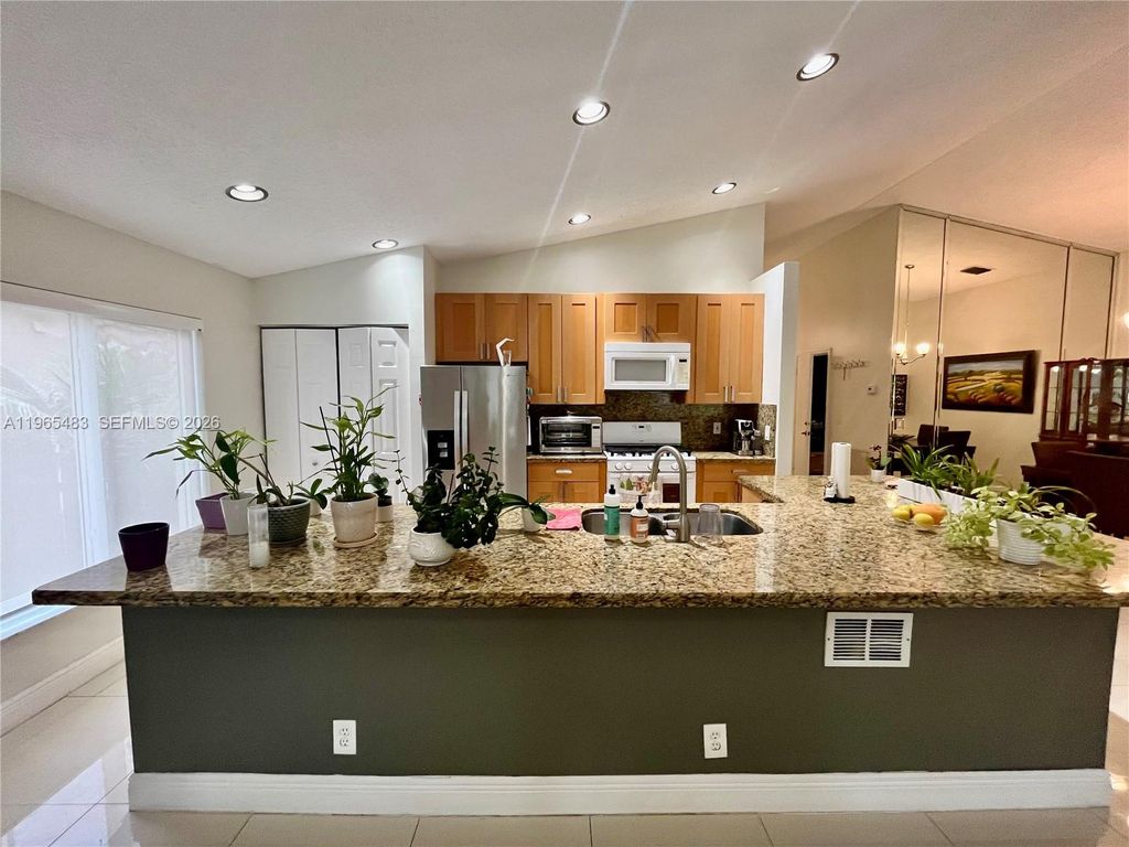 Photo of 13244 NW 12th St, Pembroke Pines, FL 33028 (MLS # A11965483)