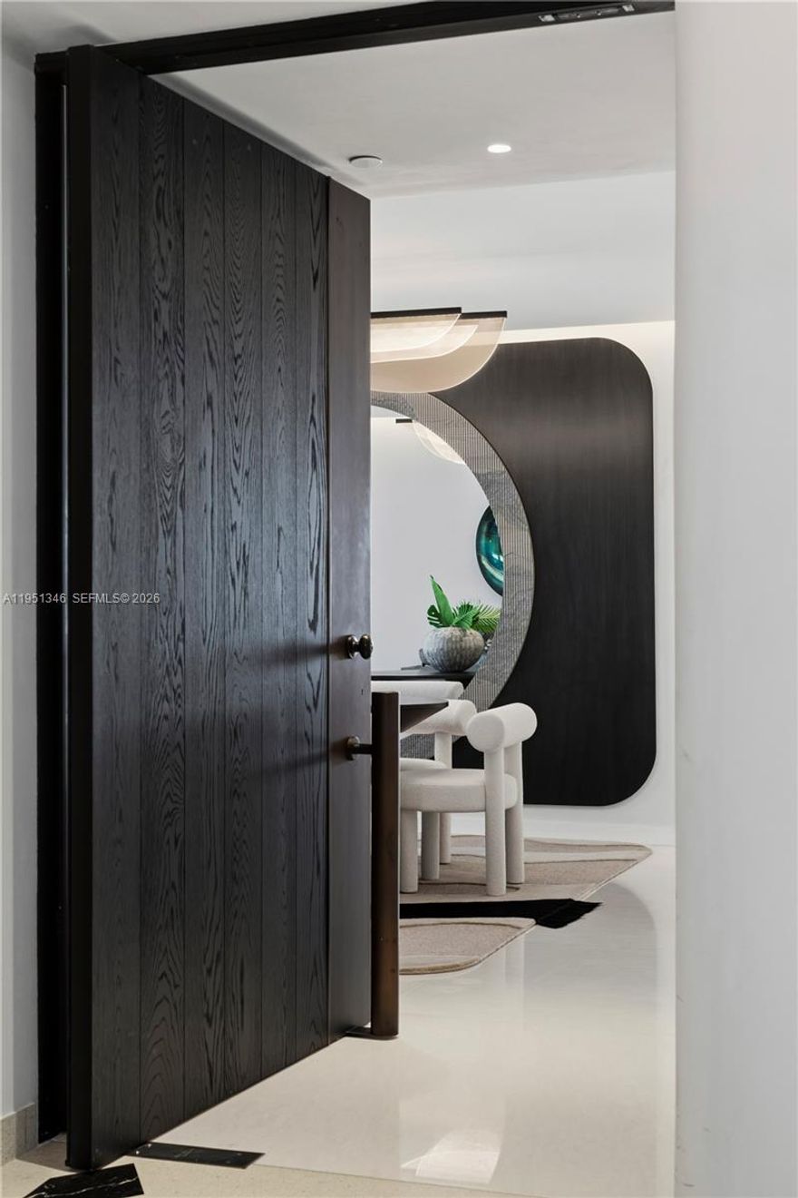 A rare, fully reimagined residence—impossible to replicate at this level. For the buyer who values design, quality, and time, this is unmatched. This is not a standard Paramount residence. The original owner completed a full gut renovation immediately after closing, reconfiguring the layout to enhance scale, flow, and functionality. The result: the only residence in the 11 Line with a true formal dining area, also ideal as a media or billiards space. Designed by top-tier New York and Florida firms, this turnkey home features over $1,000,000 in curated upgrades. Marble floors, sculptural plaster walls with soft transitions, bespoke ceilings with integrated linear air systems, Lutron, Sonos, and dramatic backlit onyx baths create a level of sophistication rarely seen. Offered fully furnished with a private cabana, delivering immediate enjoyment without the time or cost of renovation. Truly one of one.
