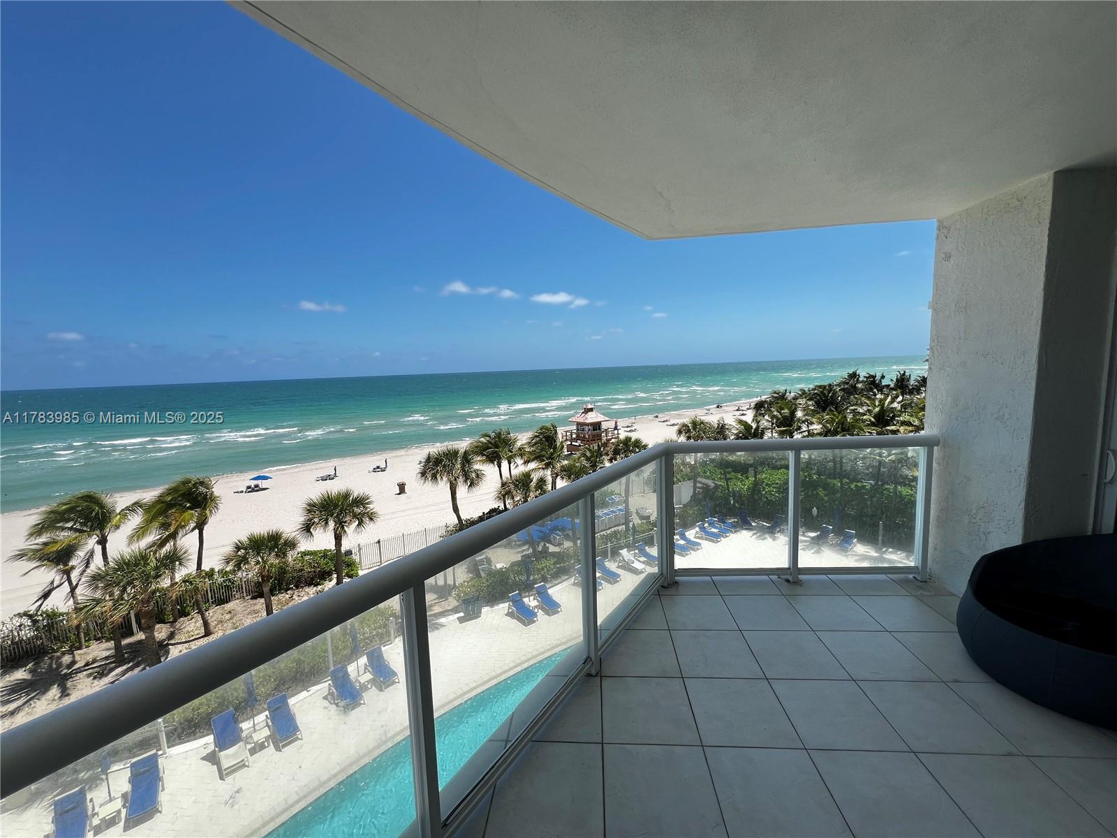 Millennium Condo / Sunny Isles Beach / Breathtaking panoramic views from this gorgeous low floor unit / 3 Beds plus Den / 3.5 Baths / Unit has over 2,200 sq. ft. plus balconies, and offers private elevator foyer entrance / Tastefully remodeled, marble and wood floors throughout. Upgraded and contemporary kitchen with top of the line appliances. Amenities include 24 hrs security & valet, tennis court, putting green, gorgeous new pool and Jacuzzi, fitness center, massage room, beach & pool service, party room, spa, dog walk area, BBQ, and playground.