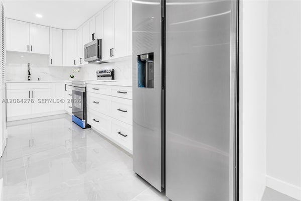 8957 NW 44TH CT, SUNRISE, FL 33351 - Image 5ef74fc70d98e83dd2cc1eafc844711b/1171199608