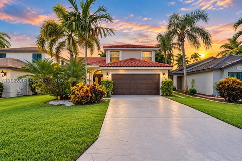 Photo of 354 SW 183rd Way, Pembroke Pines, FL 33029 (MLS # A12082903)