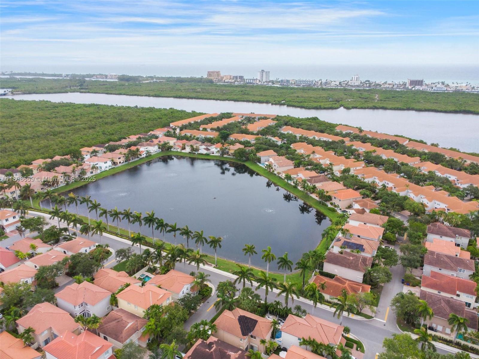 West Lake Village, three bedroom & three full bathrooms, impact windows & doors, roof 2020 & AC 2020, just under 1 mile from the renowned Hollywood Beach & Broadwalk, roof 2020, & 24-hour security for peace of mind. Enjoy the fantastic amenities that come with living in this community, including a heated pool with a chiller, a relaxing hot tub & new gym equipment. Stay active with tennis and pickleball courts, a tot lot for the kids, a community room W/ kitchen for gatherings. Plus, the neighborhood features brand new roads and is surrounded by 4 picturesque lakes. Don't miss out on this incredible opportunity to live in such a vibrant & well-equipped community!