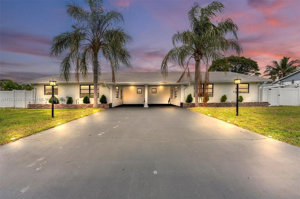 Photo of 1111 Brown Rd, Lake Worth, FL 33462 (MLS # A11723834)