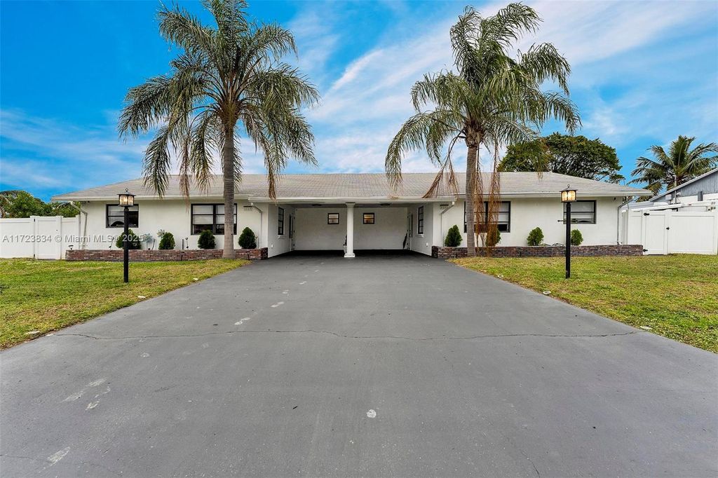 Photo of 1111 Brown Rd, Lake Worth, FL 33462 (MLS # A11723834)