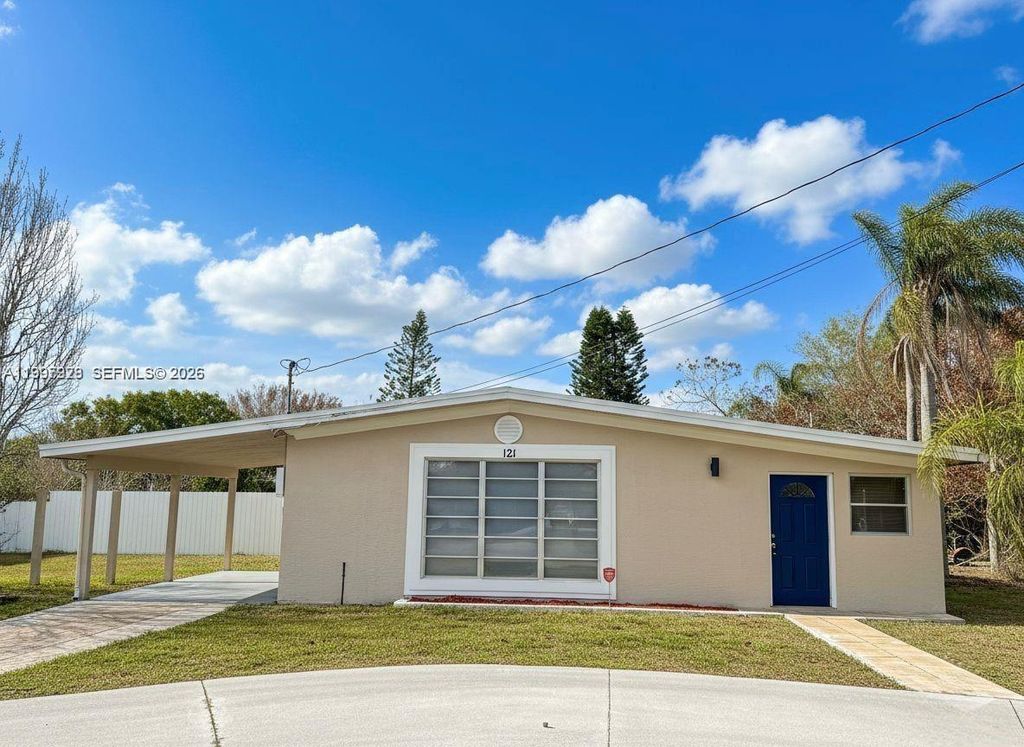 Photo of 121 NE Prima Vista Blvd, Port St Lucie, FL 34983 (MLS # A11997928)