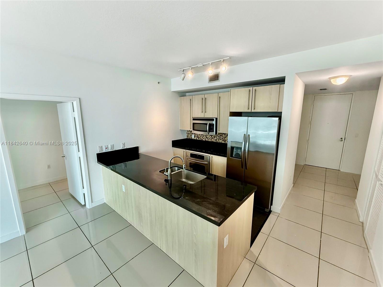 79 SW 12th St 1909-S + DEN