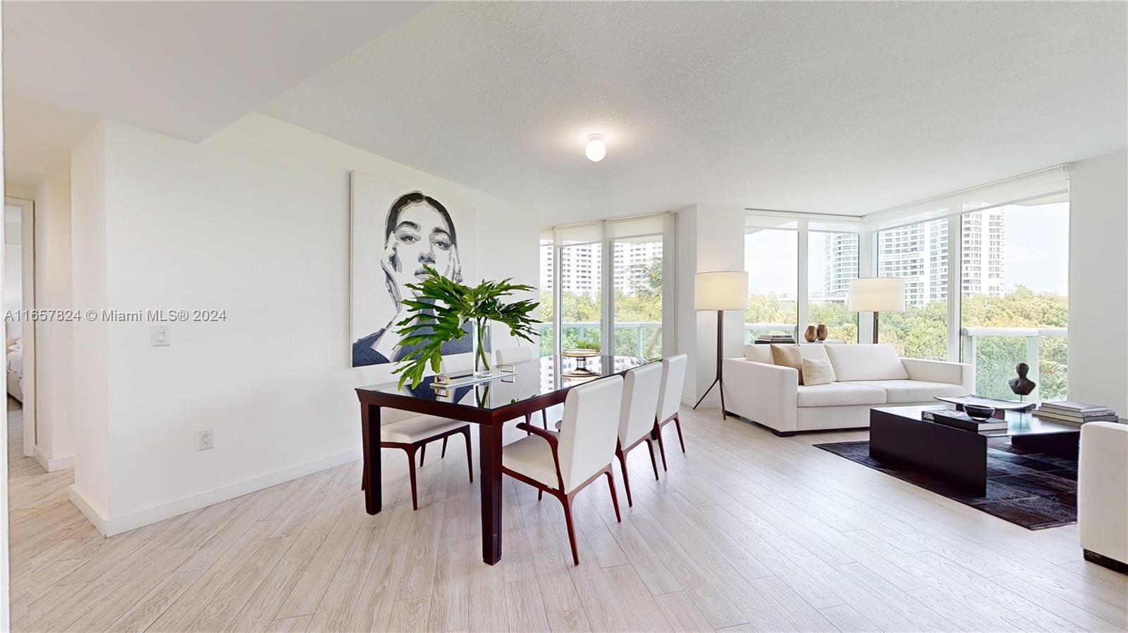 Luxurious 2 bed, 2.5 bath, laundry room, unit in the prestigious Hidden Bay community of Aventura. ceramic floors, in-unit washer and dryer, 3 balconies for uninterrupted views, and generous windows to enjoy stunning panoramas of the horizon and Intracoastal Ocean. Enjoy the elegance and sophistication of each room. The modern interior features sleek lines, high-end finishes and 2 spacious bedrooms with walk-in closets. offers resort-style amenities: guarded entry, 2-story spa, private marina, tennis and pickleball courts, and fitness center. Own this exquisite apartment to enjoy luxury living near Aventura Mall. Parking space -No. M-80 1 Bin (size of dog cage) No. 138