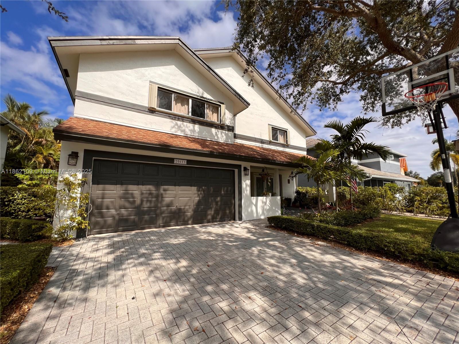 Beautiful two-story home with cathedral ceilings, large windows, and an abundance of natural light. This spacious residence features 4 bedrooms, 2.5 bathrooms, and elegant white porcelain floors throughout.The large eat-in kitchen has stainless steel appliances, granite counter tops, large sink and lots of storage space. Enjoy the peace of mind of high-impact doors and the comfort of both an inviting front porch and a private back terrace.
The home also offers a double garage, no rear neighbors, and a bright, open layout perfect for modern living. Conveniently located across from Price Park and close to top-rated A+ schools.
Don’t just imagine it—come see it for yourself and picture living here!