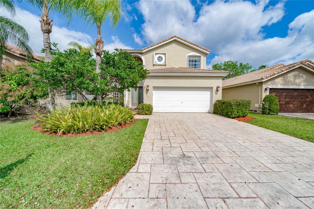 Photo of 11255 NW 53rd Ct, Coral Springs, FL 33076 (MLS # A11349065)