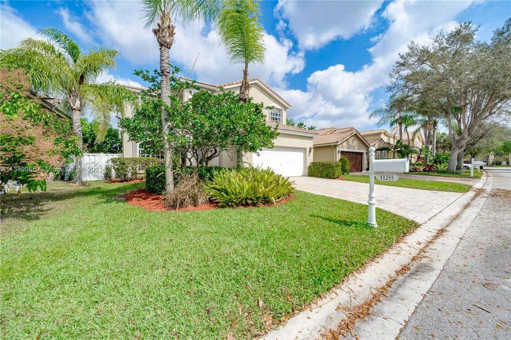 Photo of 11255 NW 53rd Ct, Coral Springs, FL 33076 (MLS # A11349065)