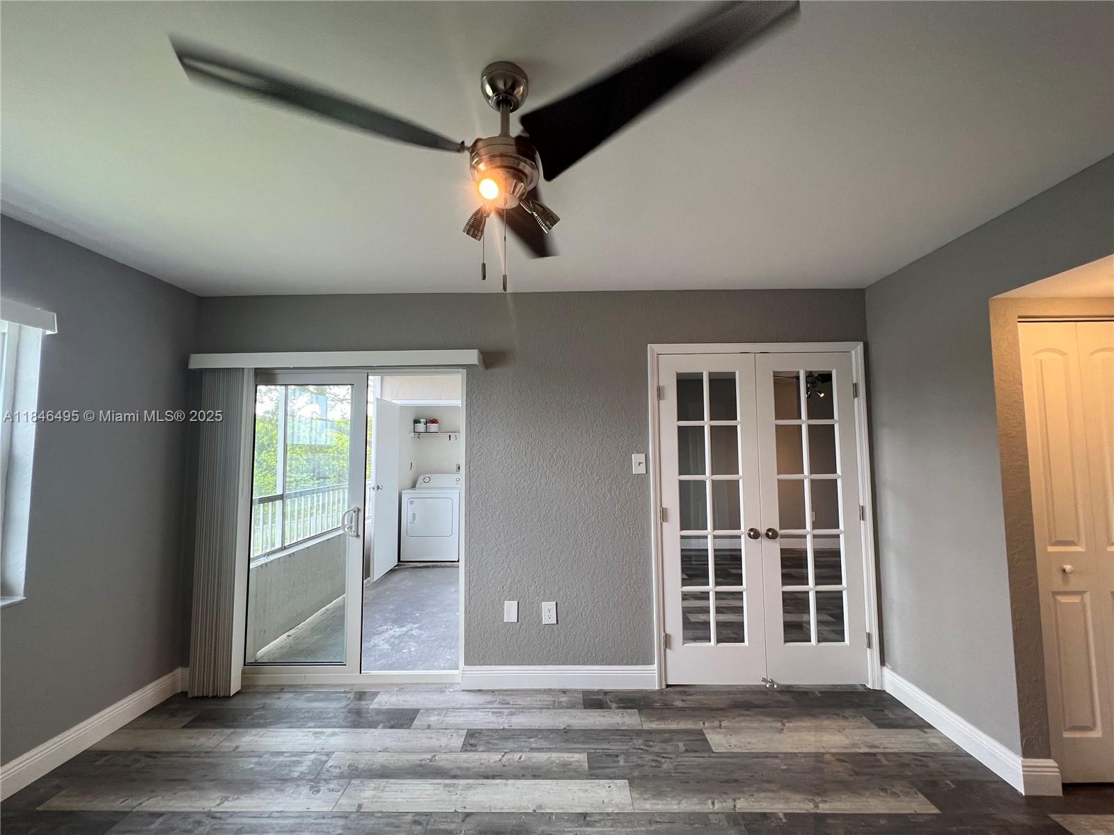 Reduced move-in costs available for applicants with excellent credit! 24-hour Approval Available. Renovated 1-bedroom, 1-bath top-floor condo with vaulted ceilings, tile and vinyl flooring, modern ceiling fans, and a spacious walk-in closet. Includes a full-size washer and dryer and stainless steel appliances. Walls will be painted gray before move-in for a modern look. Lakeview Club offers 3 pools, 2 Jacuzzis, a gym, pool table room, BBQ areas, and scenic walking trails. Optional garage available for $250/month. Located just off I-95 near Wilton Manors, Las Olas, and the beach. Pet-friendly. Water, sewer, and trash included. August 6.