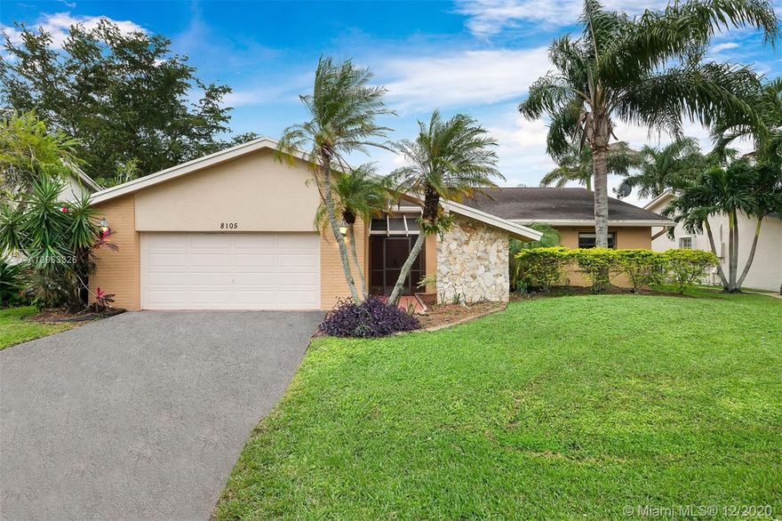 Welcome to Nutmeg Way in Woodmont Country Club! This beautifully updated home with remodeled baths and attractive tiled floors throughout offers 3 bedrooms and 2.5-baths in a spacious, open floor plan. Plenty of windows and sliders provide natural light and views of the covered lanai and pool overlooking water. The fenced rear yard and patio areas are perfect for outdoor dining and entertaining. The kitchen has newer stainless steel appliances, granite counters and plenty of cabinet and pantry space. This tastefully appointed, well-maintained home with hurricane shutters is convenient to shopping, dining, medical facilities, and offers easy access to the Turnpike and Sawgrass Expwy.