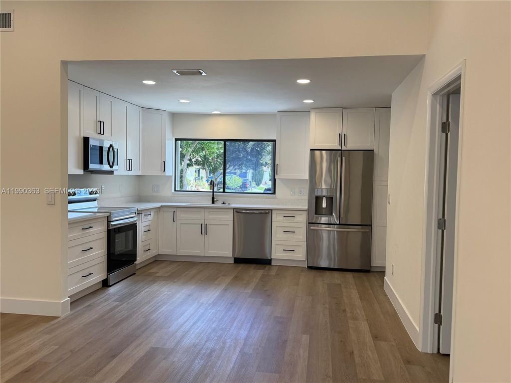 Photo of 9596 Everglades Park Ln, Boca Raton, FL 33428 (MLS # A11990363)