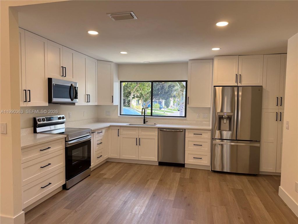 Photo of 9596 Everglades Park Ln, Boca Raton, FL 33428 (MLS # A11990363)